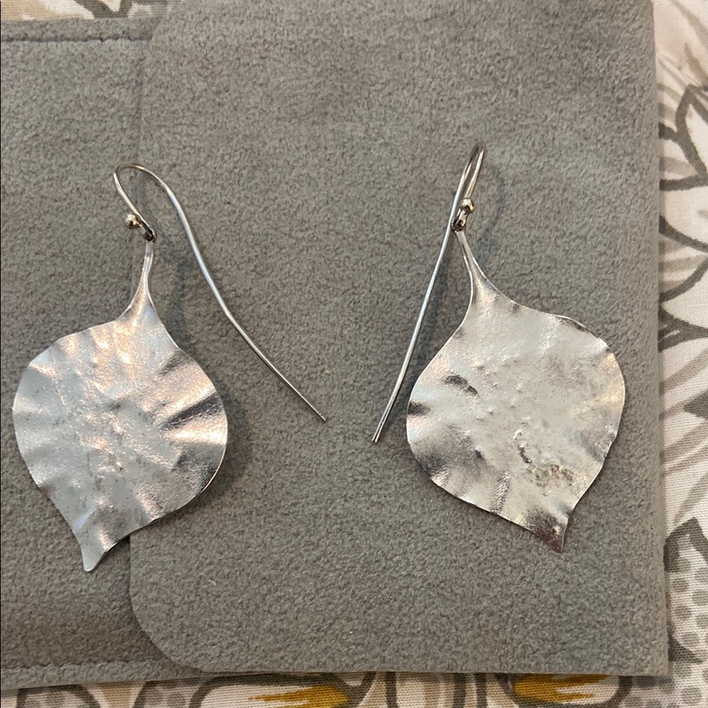 Silver Leaf-Shaped Earrings Robert’s Custom Hand work leaf earrings.